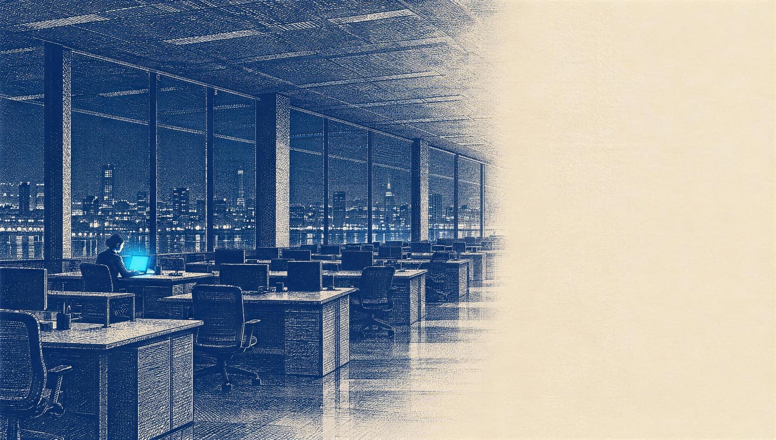 a large empty office at night, the city lit up in the windows; a single person is still working at a screen
